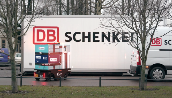 LMAD robot meetup with DB Schenker delivery van