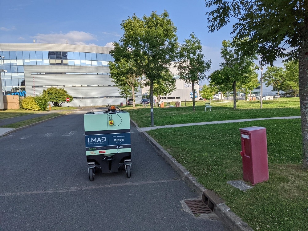 LMAD's robot on site, moving in a street